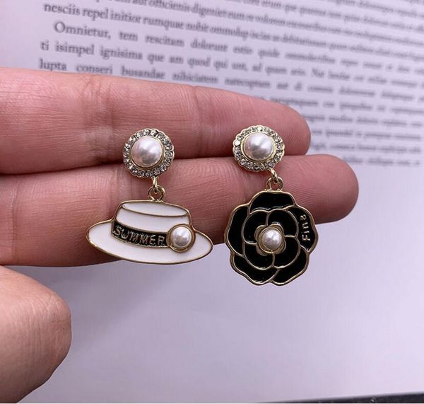 european and american camellia letters dangle & chandelier drip oil hat korean personality temperament retro pearl earrings high quality, Silver
european and american camellia letters dangle & chandelier drip oil hat korean personality temperament retro pearl earrings high quality, Silver