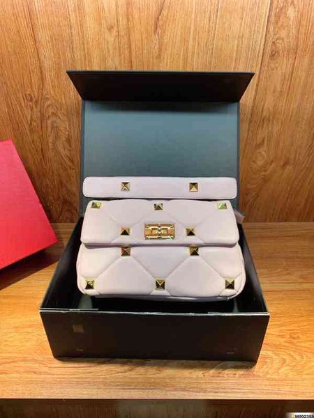 crossbody cowhide bag with rivets eye-catching and unique design ladies shoulder bags metal buckle chain diamond handbag
crossbody cowhide bag with rivets eye-catching and unique design ladies shoulder bags metal buckle chain diamond handbag