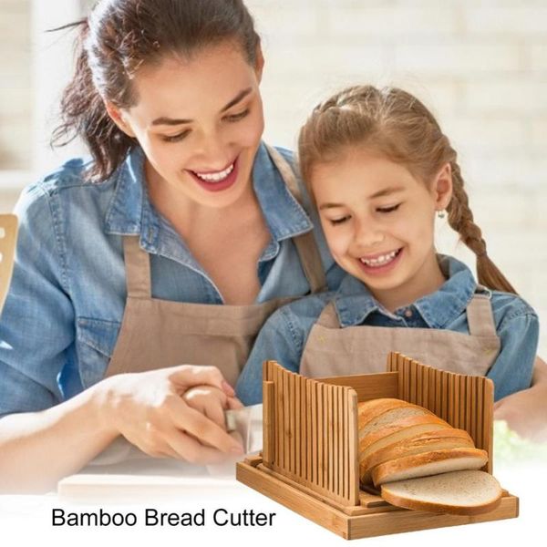 natural bamboo bread slicer with crumb tray compact cutter for slicing homemade bread, baked french baking & pastry tools
natural bamboo bread slicer with crumb tray compact cutter for slicing homemade bread, baked french baking & pastry tools