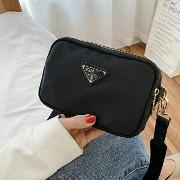 simple nylon multi-layer three zipper messenger single shoulder bag women's change mobile phone small square purses
simple nylon multi-layer three zipper messenger single shoulder bag women's change mobile phone small square purses