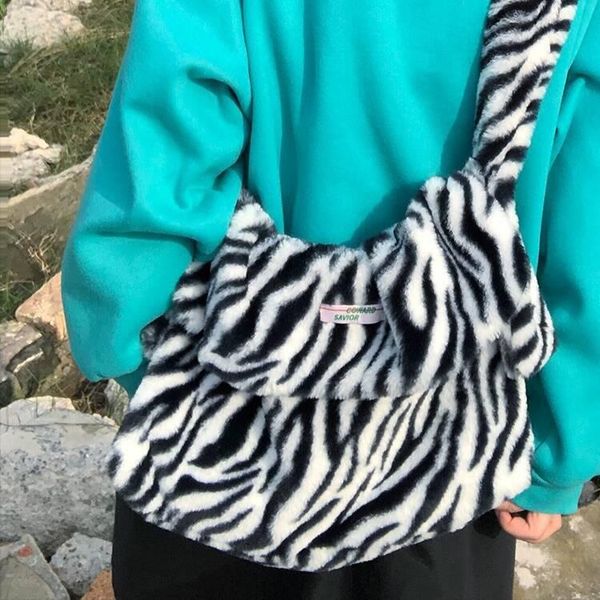 teenager zebra pattern fluffy faux fur hobo bag female student winter korean fashion soft large big capacity cute messenger totes
teenager zebra pattern fluffy faux fur hobo bag female student winter korean fashion soft large big capacity cute messenger totes