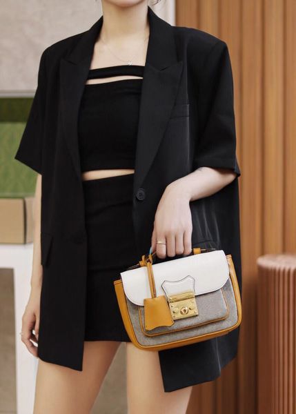 658487 padlock mini cross body bag with golden square lock classic coated canvas leather cover handle versatile for petite handbag
658487 padlock mini cross body bag with golden square lock classic coated canvas leather cover handle versatile for petite handbag
