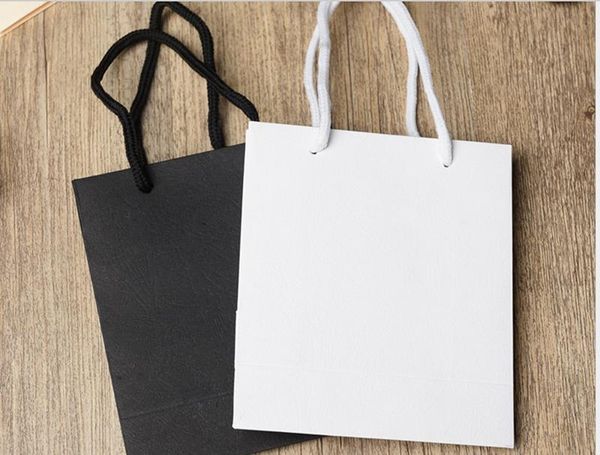 gift wrap 20pcs/lot white black simple paper bag kraft candy box with handle wedding birthday party package
gift wrap 20pcs/lot white black simple paper bag kraft candy box with handle wedding birthday party package