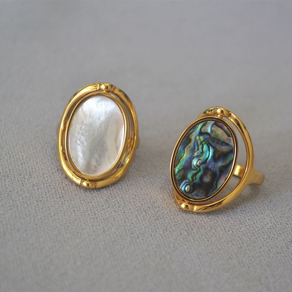 ring european and american original design doublesided rotatable mother shell bao bei fashionable modern personality index finger, Golden;silver
ring european and american original design doublesided rotatable mother shell bao bei fashionable modern personality index finger, Golden;silver