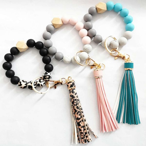 strands bracelet keyring silicone bead bracelet leather tassel wood for women, Black
strands bracelet keyring silicone bead bracelet leather tassel wood for women, Black
