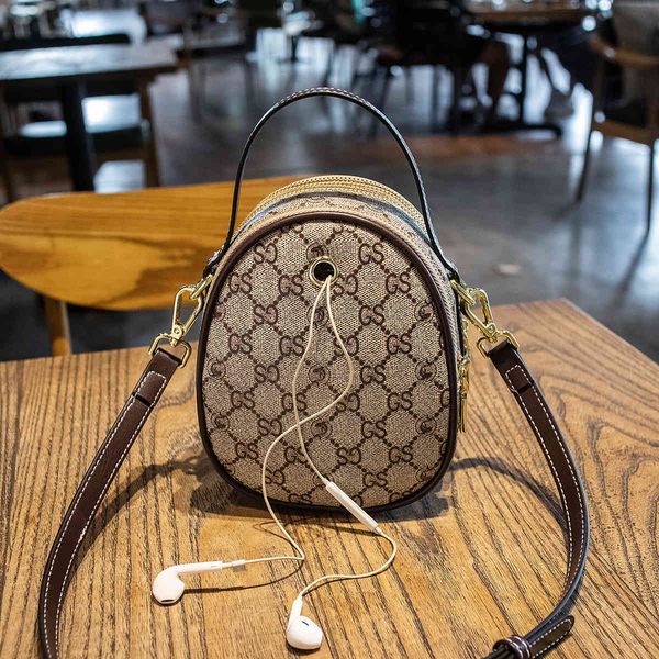 three compartment small round bag large capacity versatile hand fashion bee single shoulder bag messenger women's designer handbags
three compartment small round bag large capacity versatile hand fashion bee single shoulder bag messenger women's designer handbags