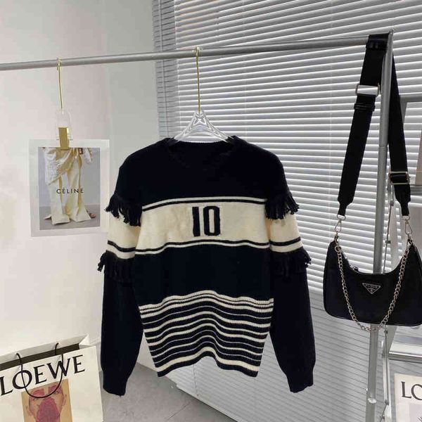 2022 factory wholesale new model 21 autumn winter black and white color matching lazy casual round neck pullover tassel sweater for women, White;black
2022 factory wholesale new model 21 autumn winter black and white color matching lazy casual round neck pullover tassel sweater for women, White;black
