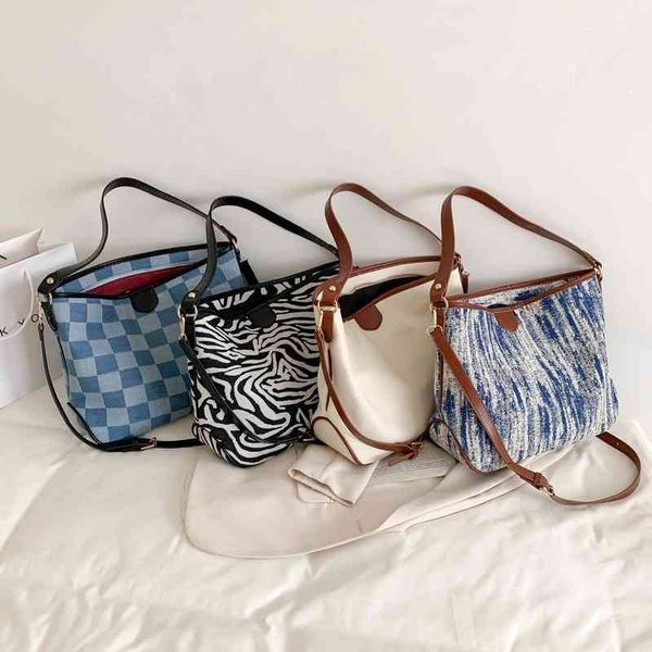 fashion canvas tote women's 2021 new high-capacity single shoulder foreign style personalized messenger bag
fashion canvas tote women's 2021 new high-capacity single shoulder foreign style personalized messenger bag