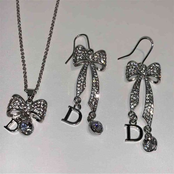 luxury designer jewelry korean version bow series suit full luxury high goddess temperament letter pendant ear hook, Silver 
luxury designer jewelry korean version bow series suit full luxury high goddess temperament letter pendant ear hook, Silver