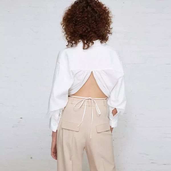 latest european and american star models bandage white waistless pleated ladies shirt
latest european and american star models bandage white waistless pleated ladies shirt