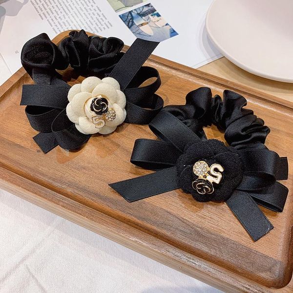 korean no.5 camellia elastic hair bands fashion ring ponytail holder headband rubber band for women girls accessories
korean no.5 camellia elastic hair bands fashion ring ponytail holder headband rubber band for women girls accessories