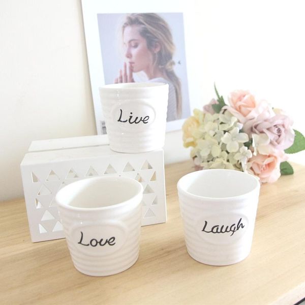 vases love live laugh round ceramic vase flower pot coffee pastoral decoration 
vases love live laugh round ceramic vase flower pot coffee pastoral decoration