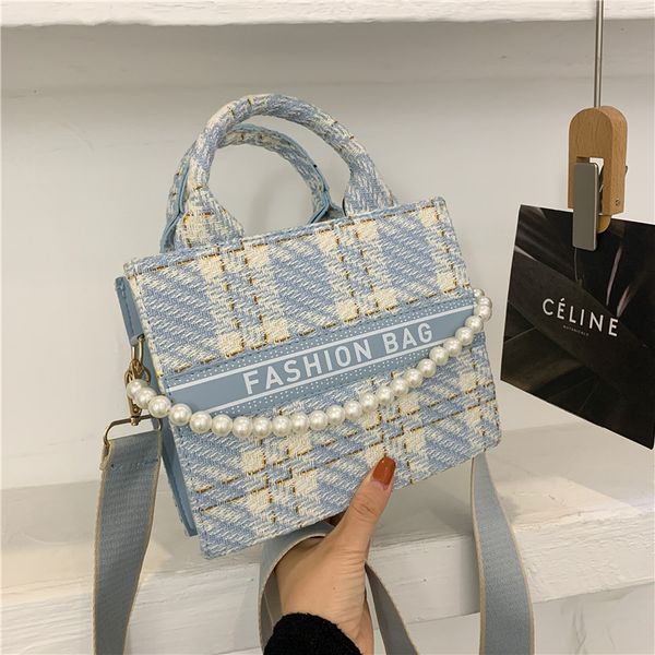design jewelry tot bag female new korean fashion bags letter flower lattice pearl chain one shoulder messenger bag
design jewelry tot bag female new korean fashion bags letter flower lattice pearl chain one shoulder messenger bag