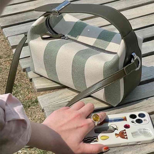 small cowhide canvas stripe large capacity toast women's fashion one shoulder portable bento bag
small cowhide canvas stripe large capacity toast women's fashion one shoulder portable bento bag