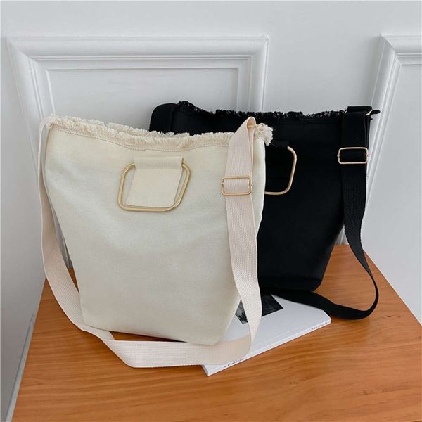 autumn canvas bag female 2021 korean ins menger edging metal hand bucket tote bag tide
autumn canvas bag female 2021 korean ins menger edging metal hand bucket tote bag tide