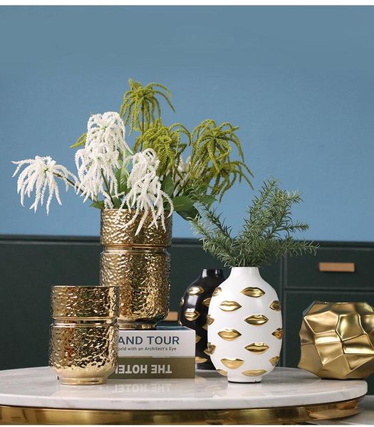 creative electroplating golden water ripple shape ceramic vase living room deskornaments home decoration accessorice vases
creative electroplating golden water ripple shape ceramic vase living room deskornaments home decoration accessorice vases