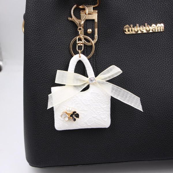 keychains cute lace mini bag shape keychain pendant car female jewelry accessories and customize holder, Silver
keychains cute lace mini bag shape keychain pendant car female jewelry accessories and customize holder, Silver