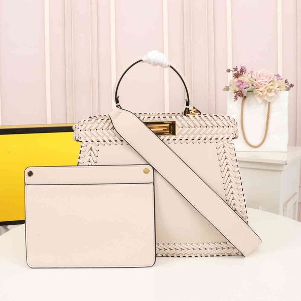 2021 designer famous brand snake decorative edge messenger bag large capacity hand woven women handbag urban business two-piece
2021 designer famous brand snake decorative edge messenger bag large capacity hand woven women handbag urban business two-piece