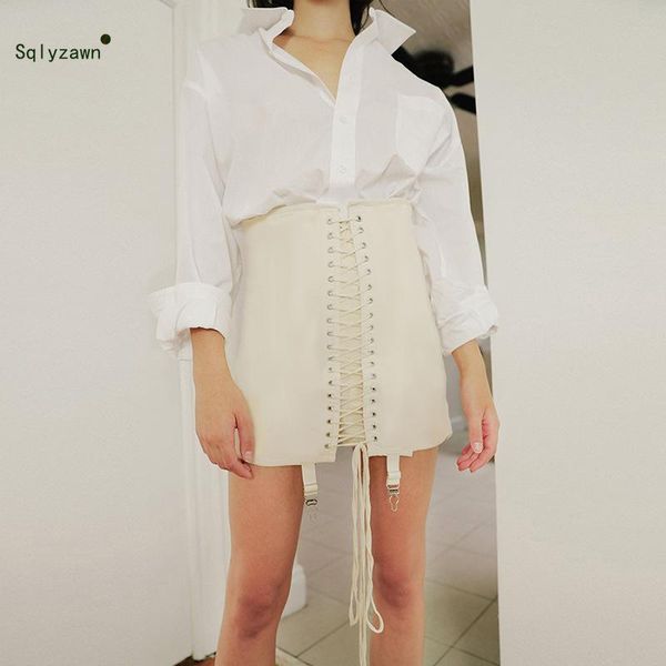 skirts 2021 women high waist solid lace up bandage mini spring and summer streetwear black white split a line bodycon skirt
skirts 2021 women high waist solid lace up bandage mini spring and summer streetwear black white split a line bodycon skirt