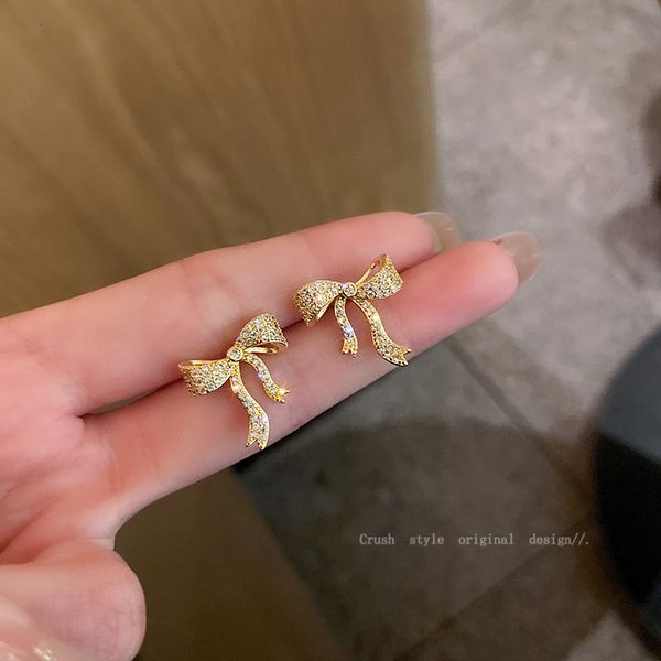 925 silver needle micro inlaid zircon fashion bow earrings designer dongdamen personalized earrings simple temperament earrings, Golden
925 silver needle micro inlaid zircon fashion bow earrings designer dongdamen personalized earrings simple temperament earrings, Golden