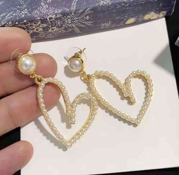 70% off new shaped pearl earrings peach heart earrings net red same girl, Silver
70% off new shaped pearl earrings peach heart earrings net red same girl, Silver
