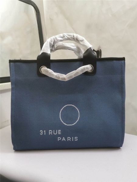 designer luxury deauville gm tote bag a66941 denim leather navy gold hardware shopping purse woman new fashion totes size 39*20*30cm new
designer luxury deauville gm tote bag a66941 denim leather navy gold hardware shopping purse woman new fashion totes size 39*20*30cm new