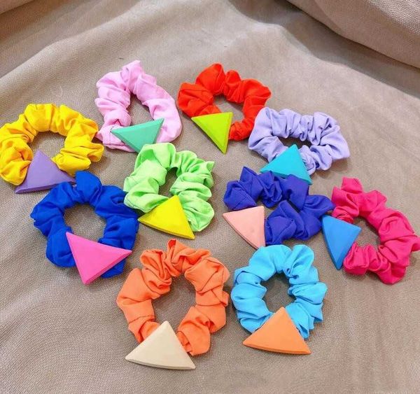 european and american triangle letter rubber band net red color big brand wild outing meatball hair circle female fast delivery, Pink
european and american triangle letter rubber band net red color big brand wild outing meatball hair circle female fast delivery, Pink