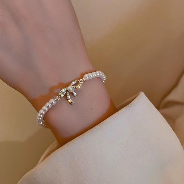 link, chain korean trendy bowknot pearl bracelet for women elegant inlaid zircon gold colors women's wedding jewelry, Black
link, chain korean trendy bowknot pearl bracelet for women elegant inlaid zircon gold colors women's wedding jewelry, Black