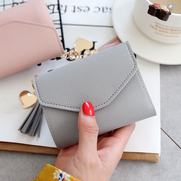 wallet 2021 women's litchi pattern simple metal heart pendant tassel short fashion trend multifunctional, Red;black
wallet 2021 women's litchi pattern simple metal heart pendant tassel short fashion trend multifunctional, Red;black