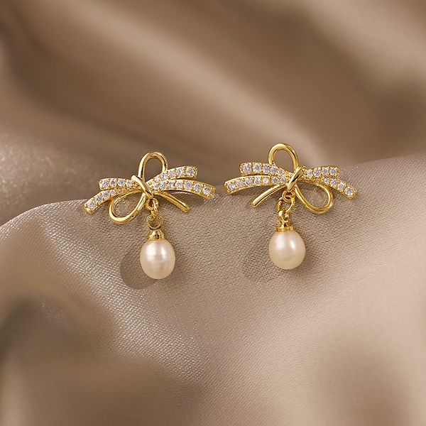 bow new silver needle design, knot pearl earrings, feminine temperament, tie selected geometric earrings, Golden;silver
bow new silver needle design, knot pearl earrings, feminine temperament, tie selected geometric earrings, Golden;silver