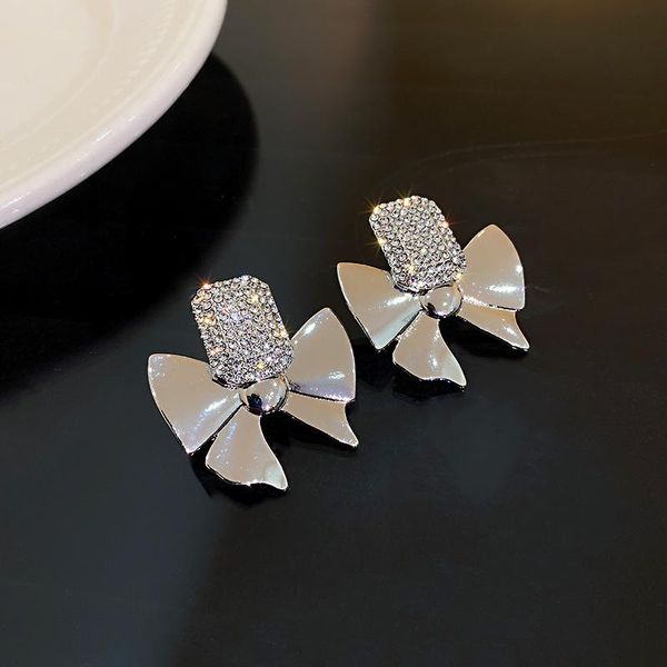 dangle & chandelier minar fashion full rhinestones bowknot earrings for women korean silver color metallic cross knotted oorbellen
dangle & chandelier minar fashion full rhinestones bowknot earrings for women korean silver color metallic cross knotted oorbellen