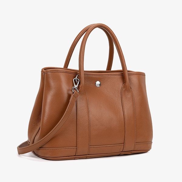 designer handbags leather women's portable simple large capacity multifunctional litchi pattern mother's garden bag
designer handbags leather women's portable simple large capacity multifunctional litchi pattern mother's garden bag