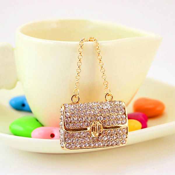 fashion metal small gift creative square lady chain bag shape keychain white rhinestone lady bag accessories, Silver
fashion metal small gift creative square lady chain bag shape keychain white rhinestone lady bag accessories, Silver