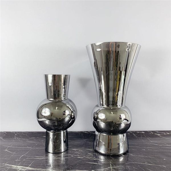 modern simple home light luxury electroplating silver glass vase model room flower decorati office soft vases
modern simple home light luxury electroplating silver glass vase model room flower decorati office soft vases