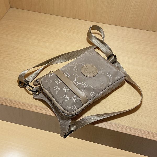 designer nylon women's new fashion high-capacity oxford cloth mobile phone bag leisure style single shoulder messenger bag handbags out
designer nylon women's new fashion high-capacity oxford cloth mobile phone bag leisure style single shoulder messenger bag handbags out