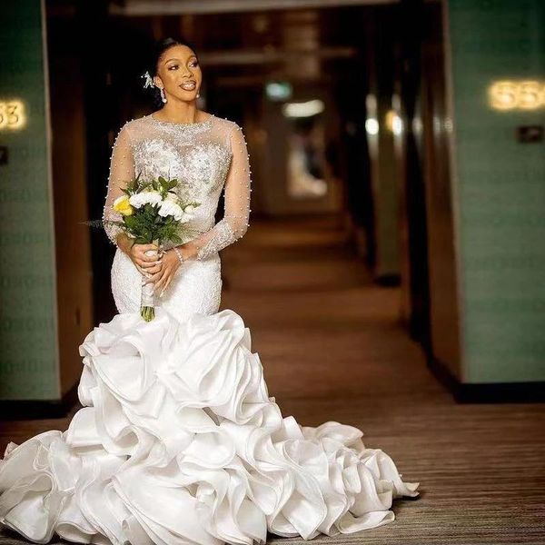 african mermaid wedding dresses sheer long sleeve pearls lace applique bridal gowns ruffles sweep train robe de soirée, White
african mermaid wedding dresses sheer long sleeve pearls lace applique bridal gowns ruffles sweep train robe de soirée, White
