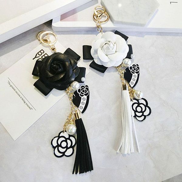 keychains luxury bag black white woman keychain plush car camellia bags key chain, Silver
keychains luxury bag black white woman keychain plush car camellia bags key chain, Silver