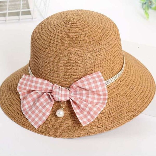 korean parent child bow pearl big brim straw children's summer travel sun hat, Yellow
korean parent child bow pearl big brim straw children's summer travel sun hat, Yellow