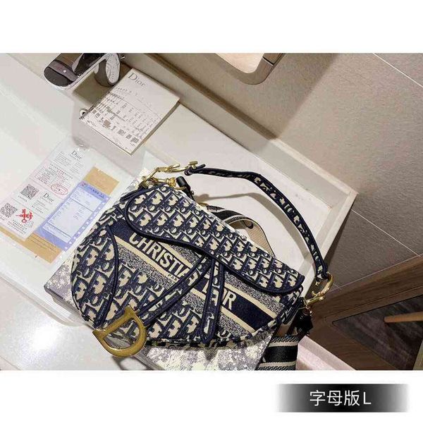 2021 women's bag d-shaped saddle bag embroidered canvas versatile fashion one shoulder messenger bag zly bags
2021 women's bag d-shaped saddle bag embroidered canvas versatile fashion one shoulder messenger bag zly bags
