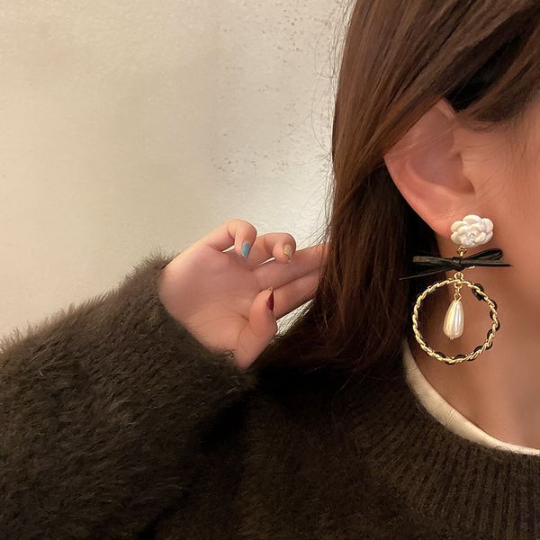 925 silver needle black leather bow flower circle earrings french simple earrings fairy temperament earrings, Golden;silver 
925 silver needle black leather bow flower circle earrings french simple earrings fairy temperament earrings, Golden;silver