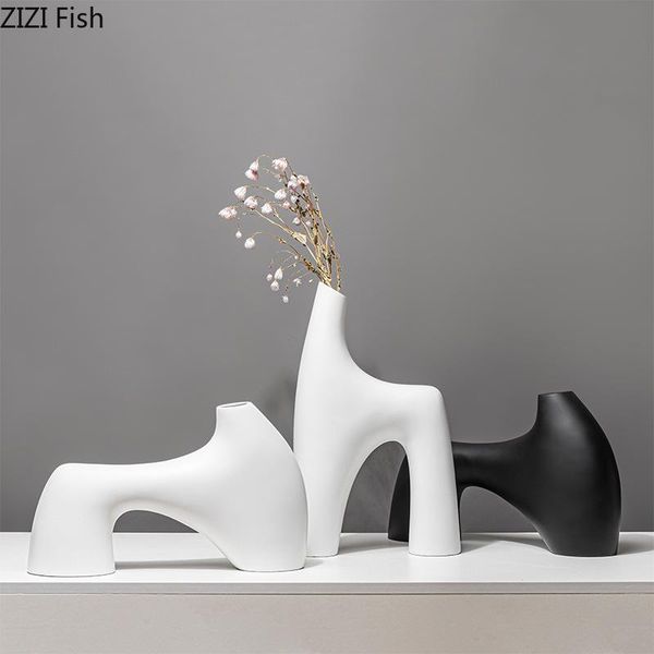 vases modern special-shaped white resin vase flower arrangement table decoration geometric irregular home accessories
vases modern special-shaped white resin vase flower arrangement table decoration geometric irregular home accessories