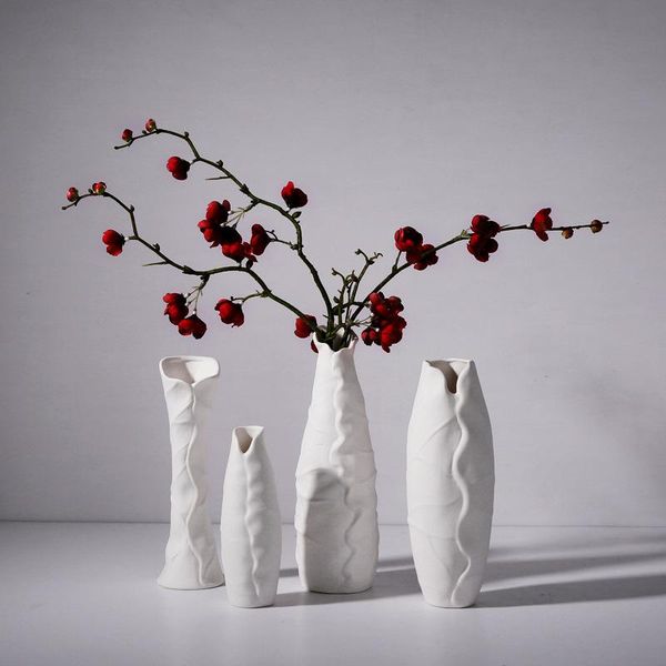 vases donglin simple modern white creative art living room ceramic flower arranging household decoration accessories
vases donglin simple modern white creative art living room ceramic flower arranging household decoration accessories