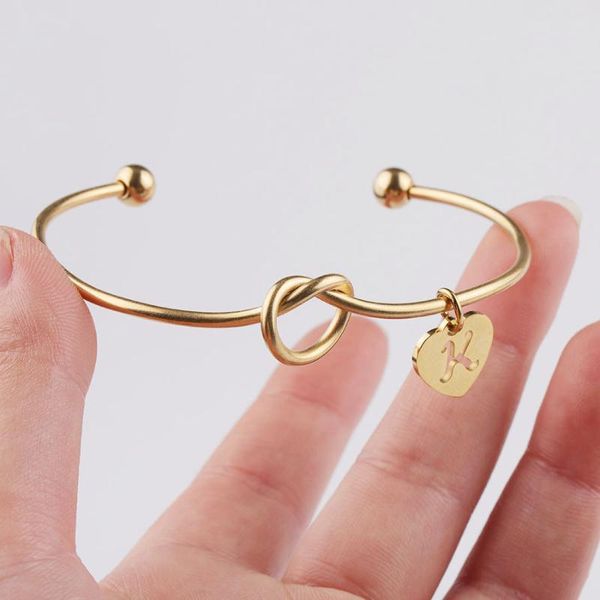 charm bracelets 100% stainless steel love knotted bracelet english letters open bangle for women gold/sliver/rose gold color, Golden;silver
charm bracelets 100% stainless steel love knotted bracelet english letters open bangle for women gold/sliver/rose gold color, Golden;silver