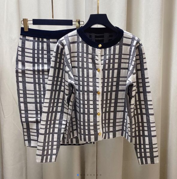 22 women's knitted cardigan + skirt suit generous long-sleeved sweater short coat hip skirt, White
22 women's knitted cardigan + skirt suit generous long-sleeved sweater short coat hip skirt, White