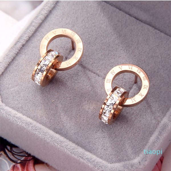 crystal earrings rose gold fashion titanium steel double winding roman digital earrings female gift jewelry., Golden;silver
crystal earrings rose gold fashion titanium steel double winding roman digital earrings female gift jewelry., Golden;silver