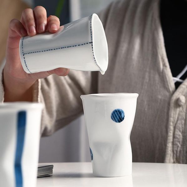 creative origami ceramic water cup nordic simple teacup mouthwash household japanese milk coffee drinkware mugs
creative origami ceramic water cup nordic simple teacup mouthwash household japanese milk coffee drinkware mugs