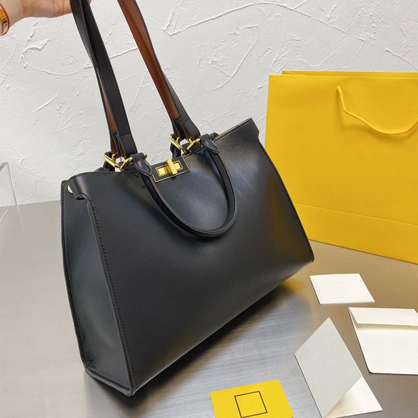 32cm lady tote bag women handbags genuine leather hand bags large capacity package shopper bag fashion f letter shoulder bag detchable strap
32cm lady tote bag women handbags genuine leather hand bags large capacity package shopper bag fashion f letter shoulder bag detchable strap