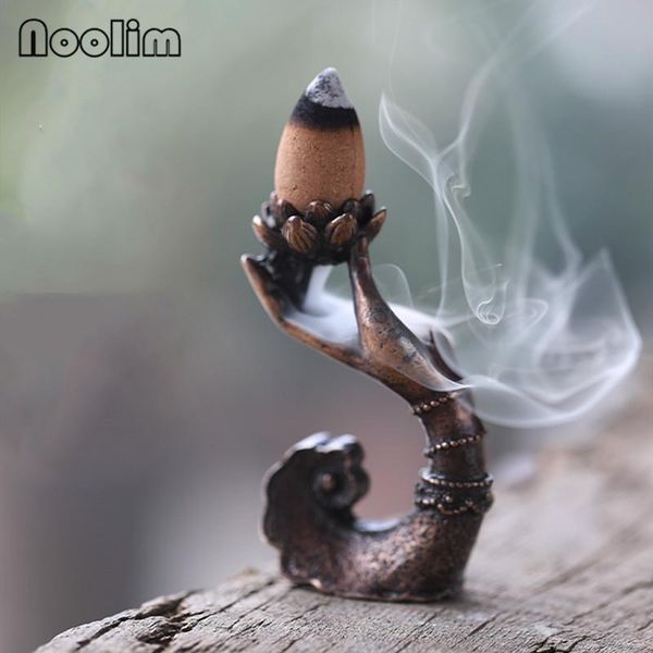 fragrance lamps metal zen buddha hand lotus backflow incense burner branch magpie waterfall censer gold phoenix stick holder home decor
fragrance lamps metal zen buddha hand lotus backflow incense burner branch magpie waterfall censer gold phoenix stick holder home decor