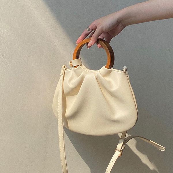 evening bags 2021 korean version arrival women's bag vintage wooden handle shoulder women luxury leather handbag and purse tote
evening bags 2021 korean version arrival women's bag vintage wooden handle shoulder women luxury leather handbag and purse tote