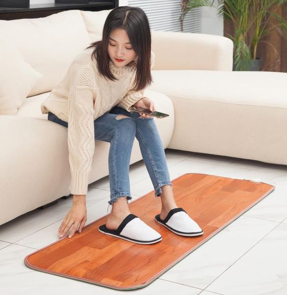 carpets 50*30cm electric heating pad office foot mat warmer winter warm feet thermostat carpet household warming film tools 1pc
carpets 50*30cm electric heating pad office foot mat warmer winter warm feet thermostat carpet household warming film tools 1pc